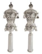 Set of silver rimonim for torah scroll - chased swirl design