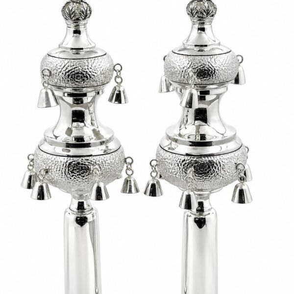 Set of silver rimonim for torah scroll - hand hammered design